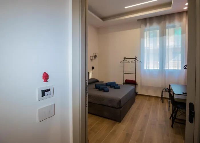 Pokoj s manželskou postelí velikosti queen