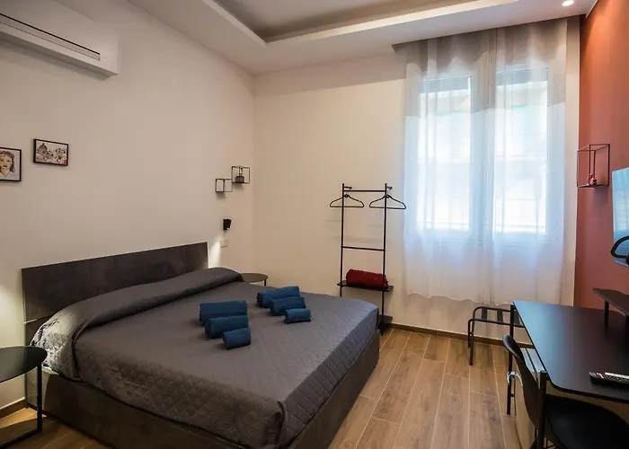 Pokoj s manželskou postelí velikosti queen